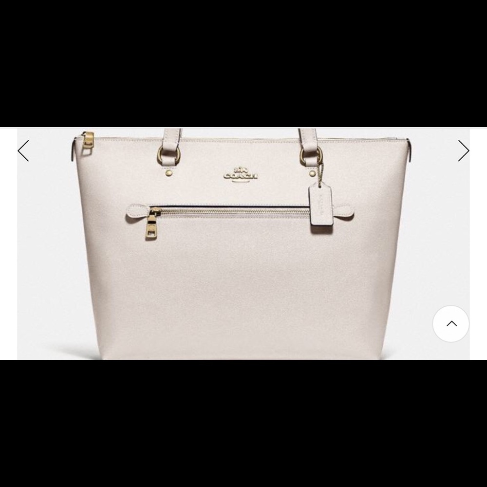 New with tags Coach Gallery tote in chalk color .